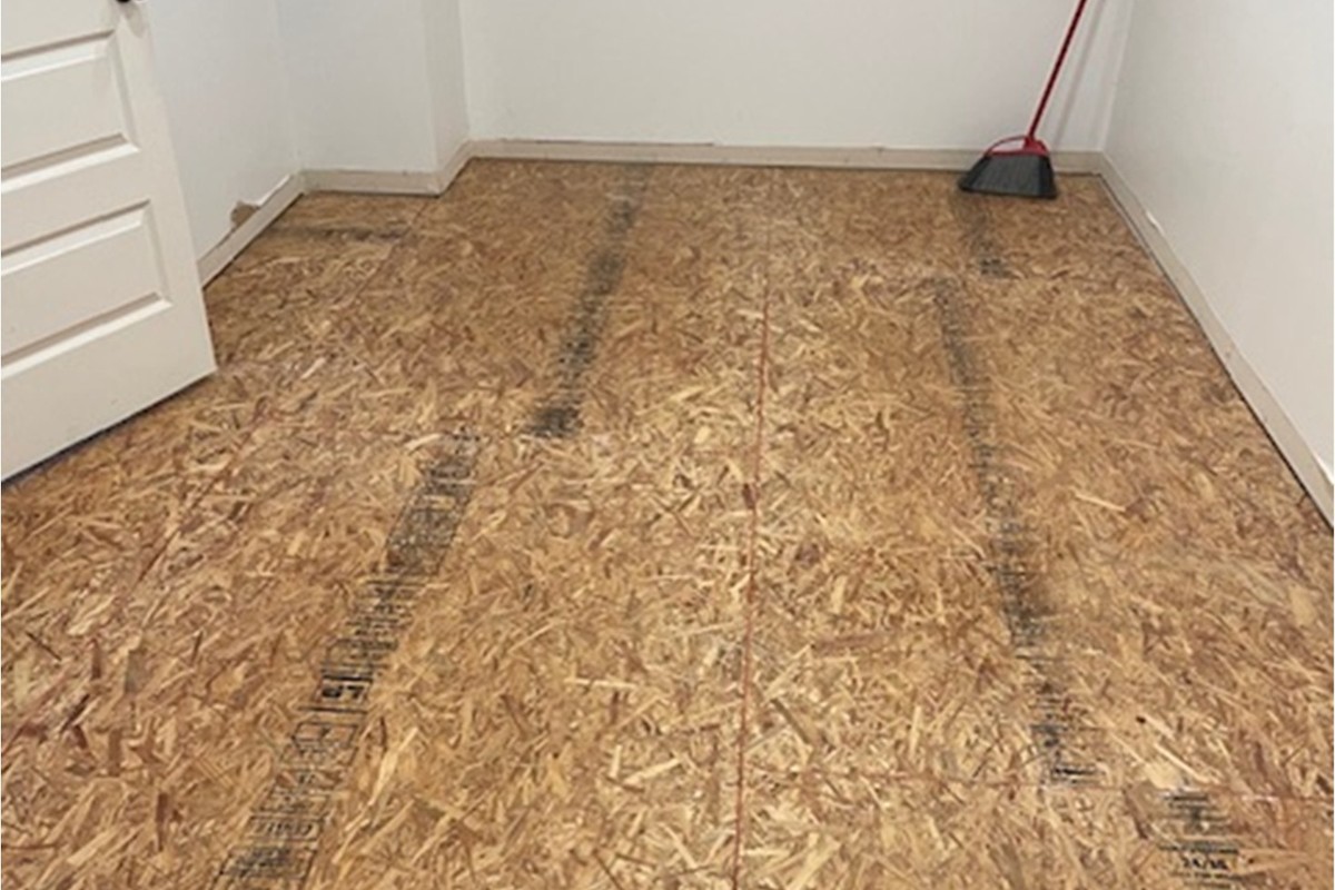 Closet floor stripped to subfloor during water damage mitigation in Gwinnett County GA