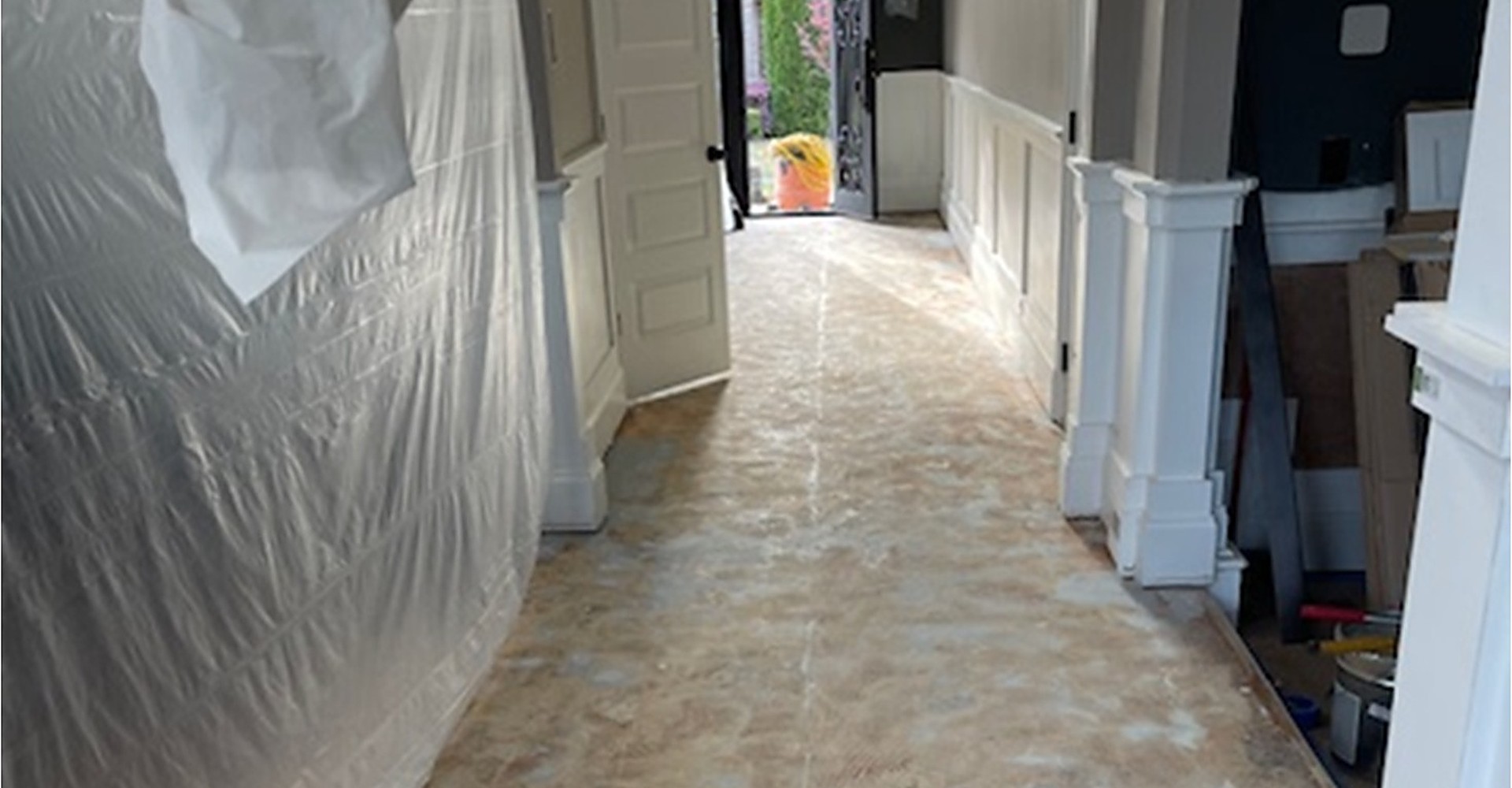 Containment and stripped flooring during whole-home water damage mitigation in Gwinnett County GA