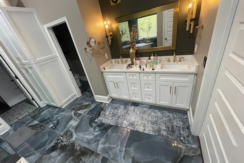 Finished master bathroom vanity after water damage restoration in Gwinnett County GA