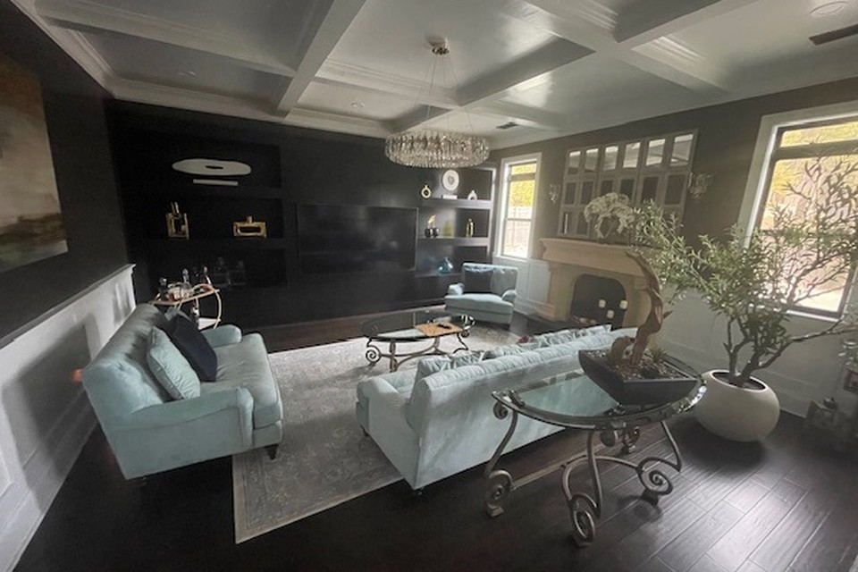 Finished coffered living room ceiling after water damage reconstruction in a Georgia home