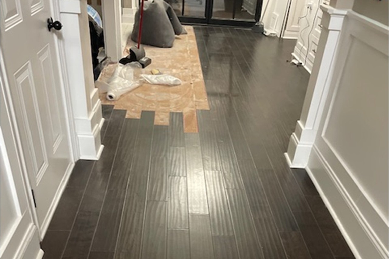 New hardwood flooring installed during the reconstruction phase