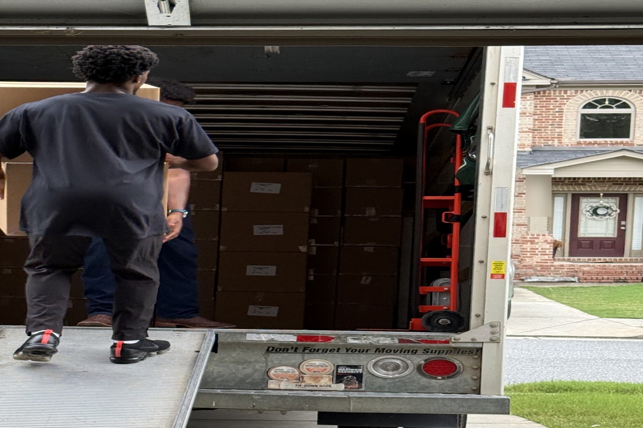 Restoration technicians loading a pack-out truck on a metro Atlanta job