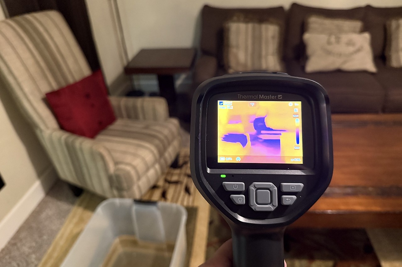 Thermal imaging camera tracing a hidden ceiling leak